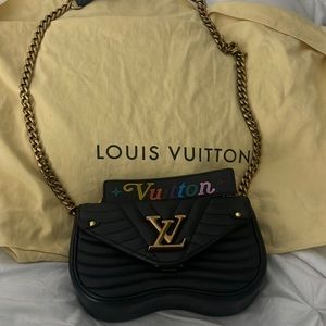 Louis Vuitton wave chain bag quilted gently used well taken care off